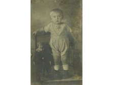 Régi gyermek fotográfia bohóccal keretben