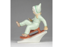Régi Aquincum porcelán szánkózó kisfiú