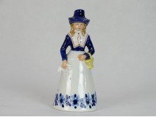 Jelzet GDR porcelán női figura csengő 19 cm