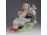 Hibátlan biszkvit porcelán gitározó lány