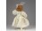 Felöltöztetett porcelán kislány baba 15 cm